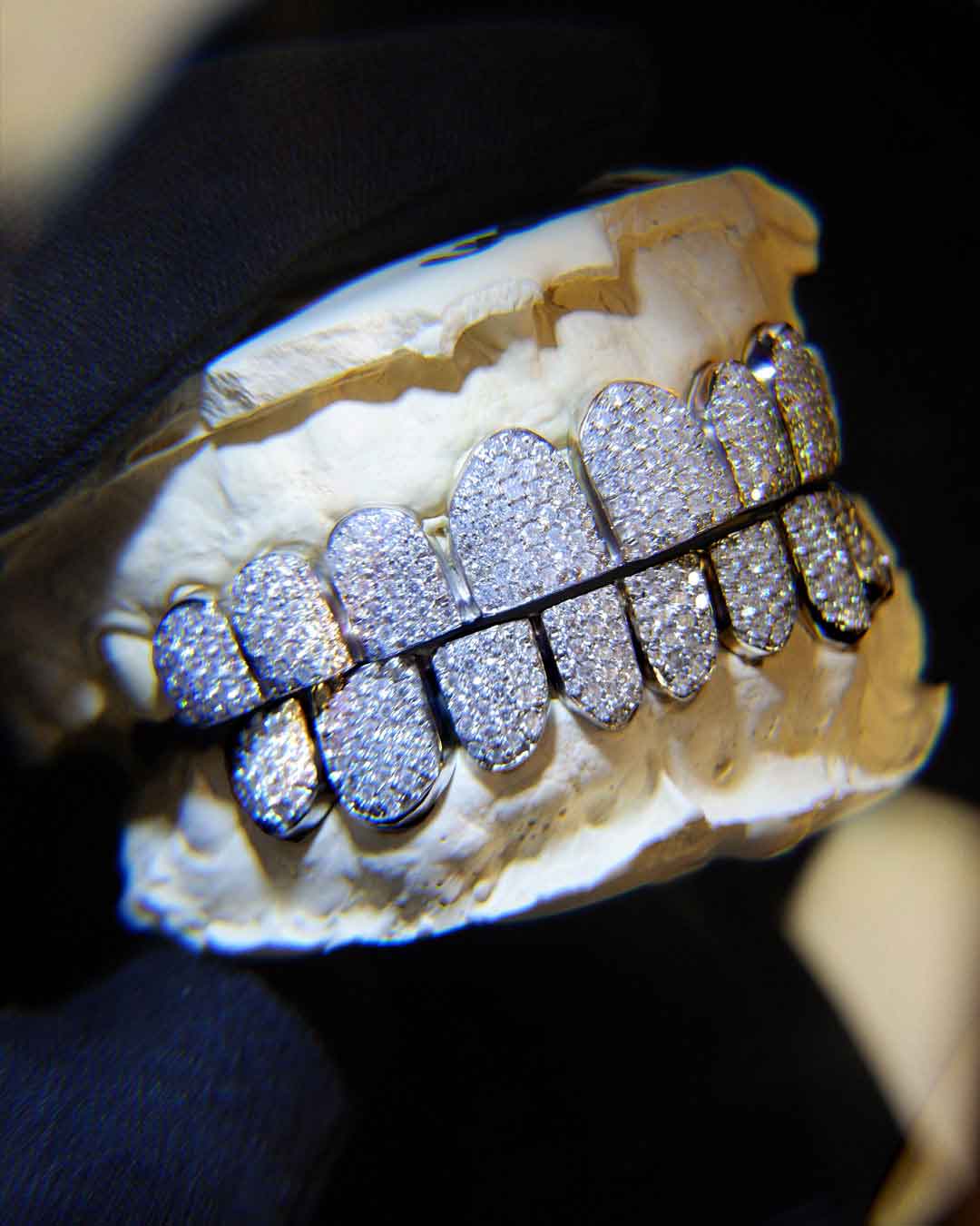 Iced-Out Grillz - Each diamond is hand-set by our jewelers to maximize sparkle. - DATUWRKS custom grillz